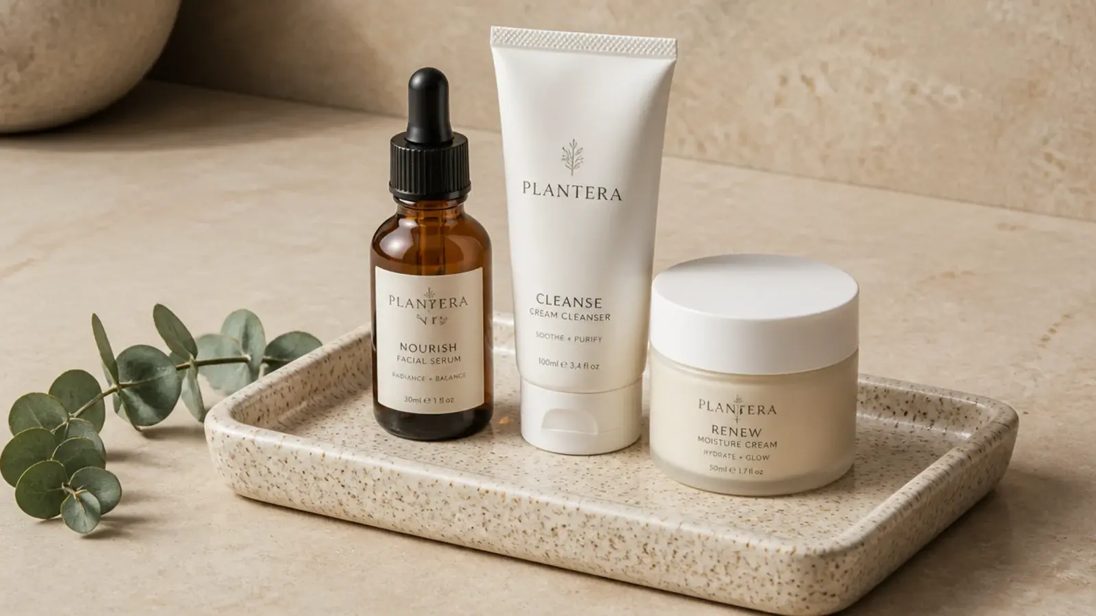stoneware vanity tray holding serum cleanser and cream in routine order