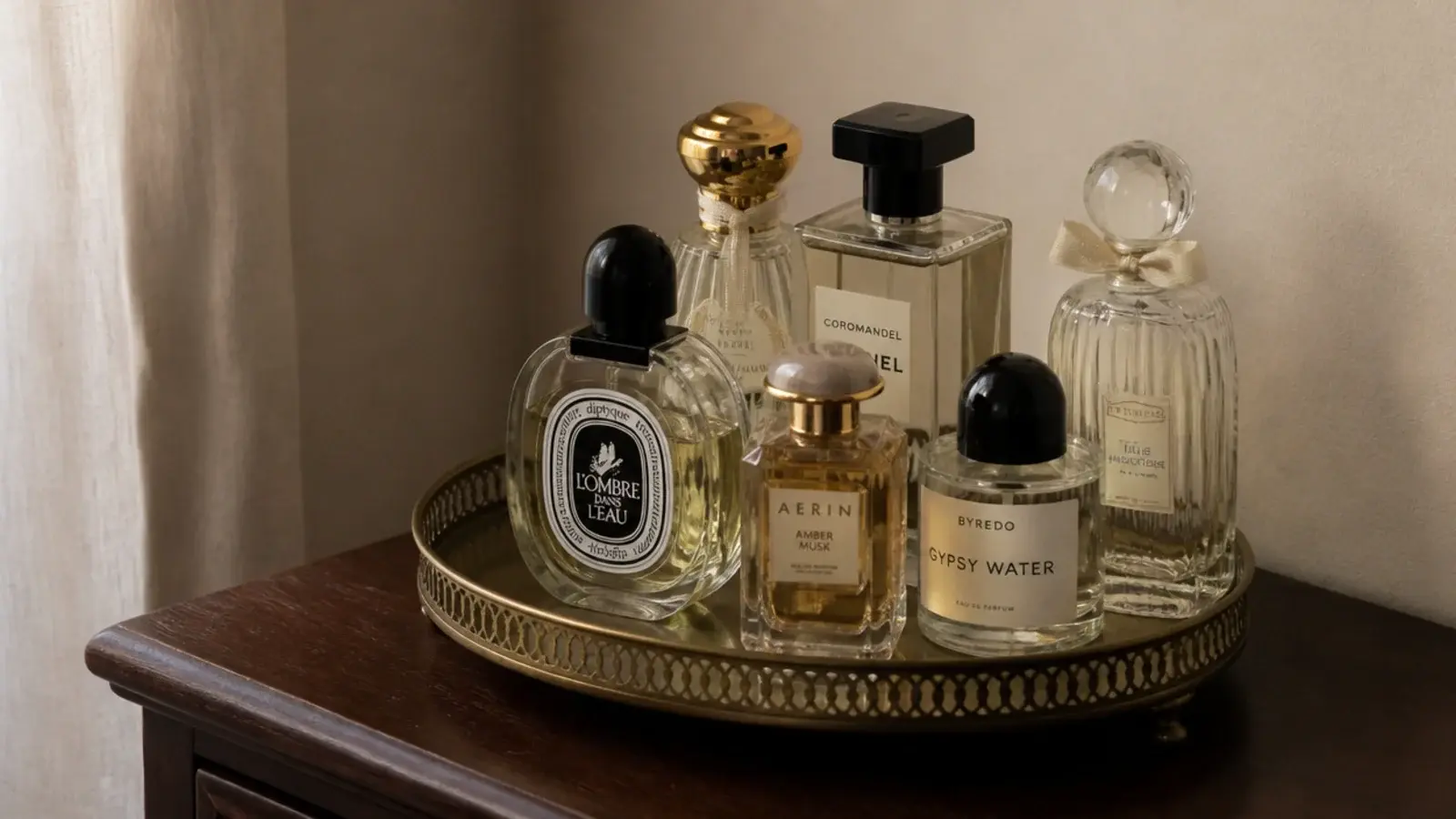 perfume bottles grouped on a shaded tray away from direct sunlight