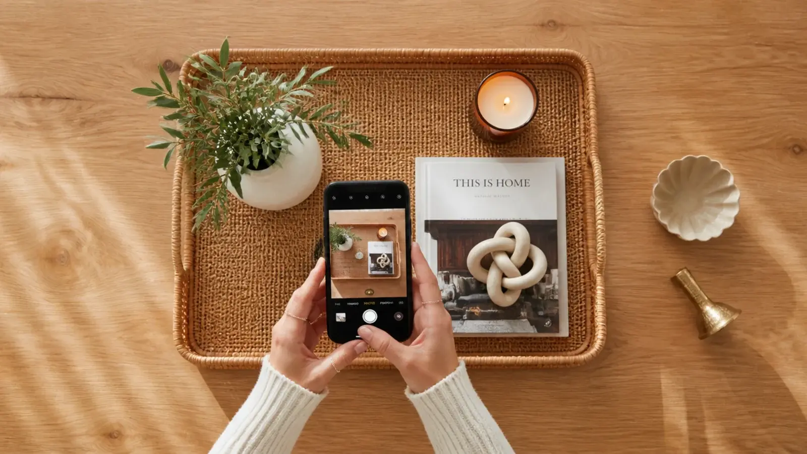 phone photographing a styled vanity tray before a final edit