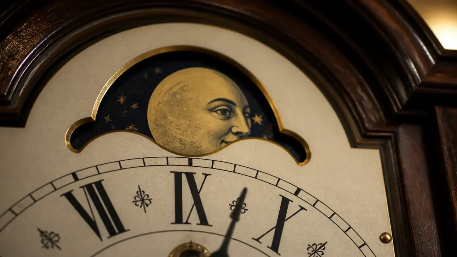 small moon phase window showing a painted moon above the numerals