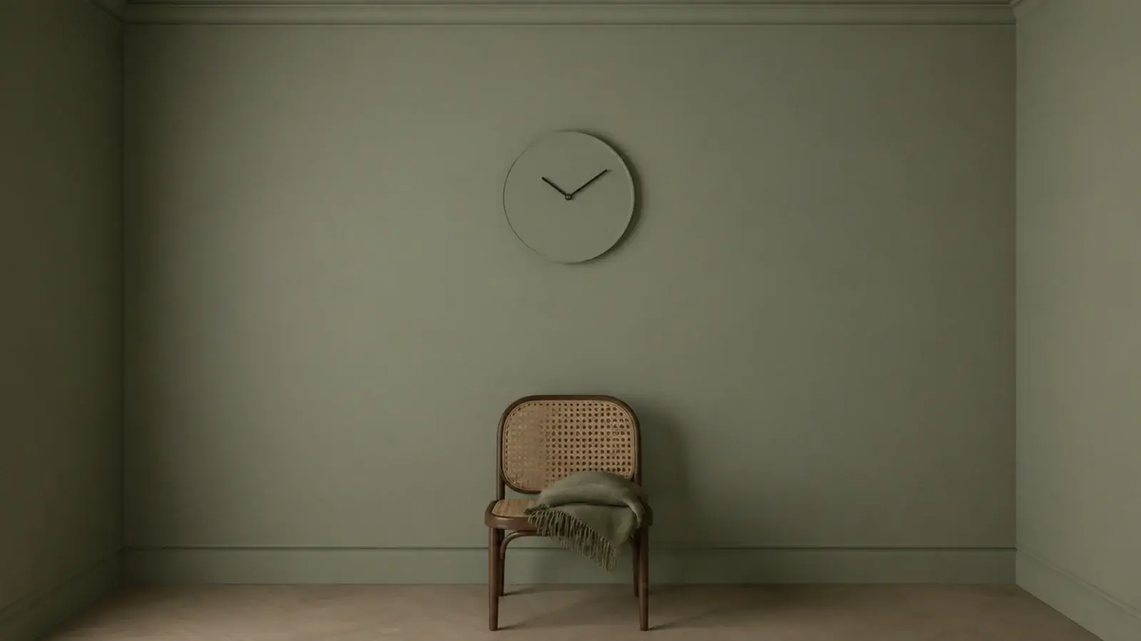 clock case painted to match a soft sage wall in a box room