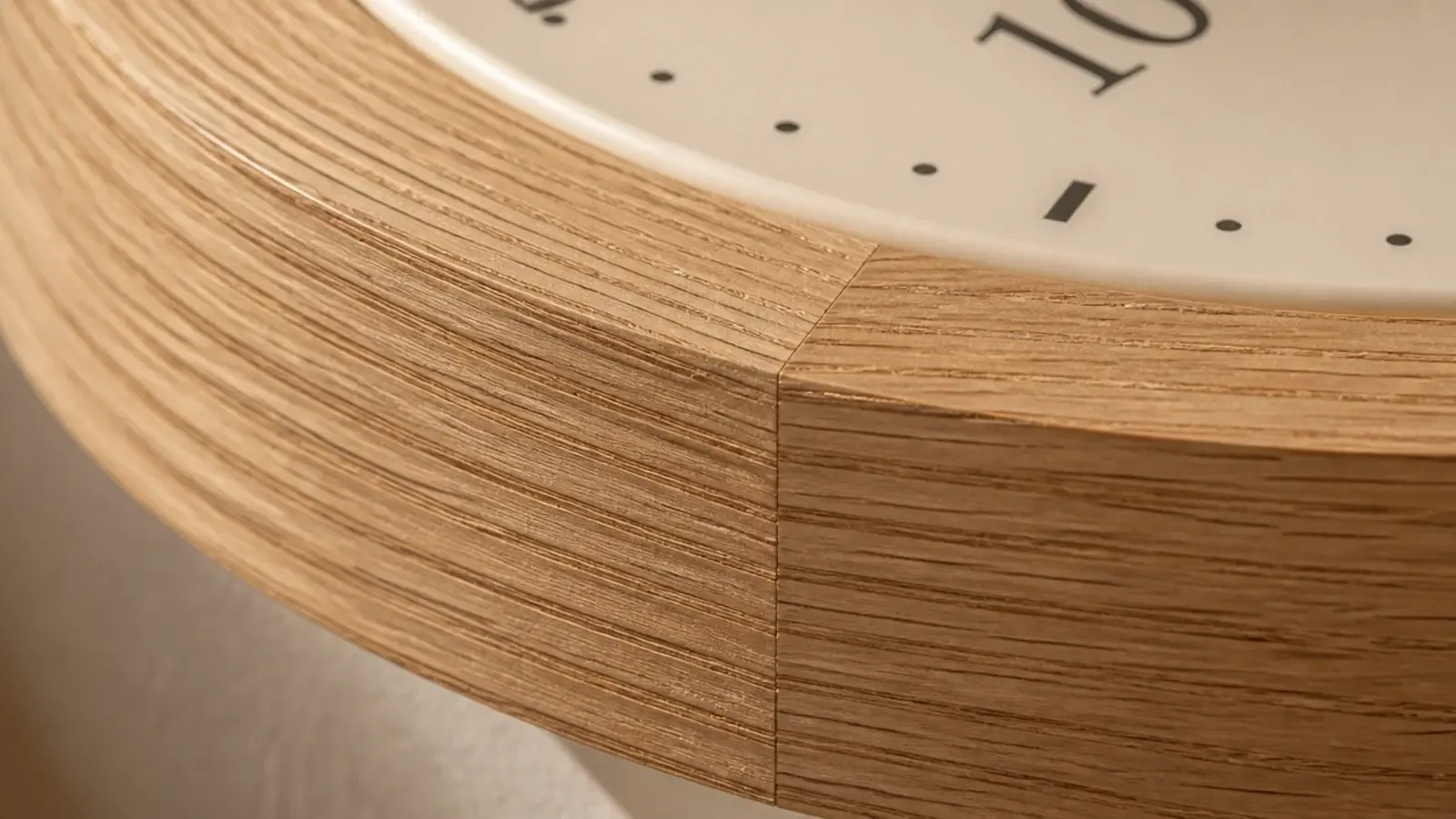 white oak clock rim with continuous grain across a mitre joint