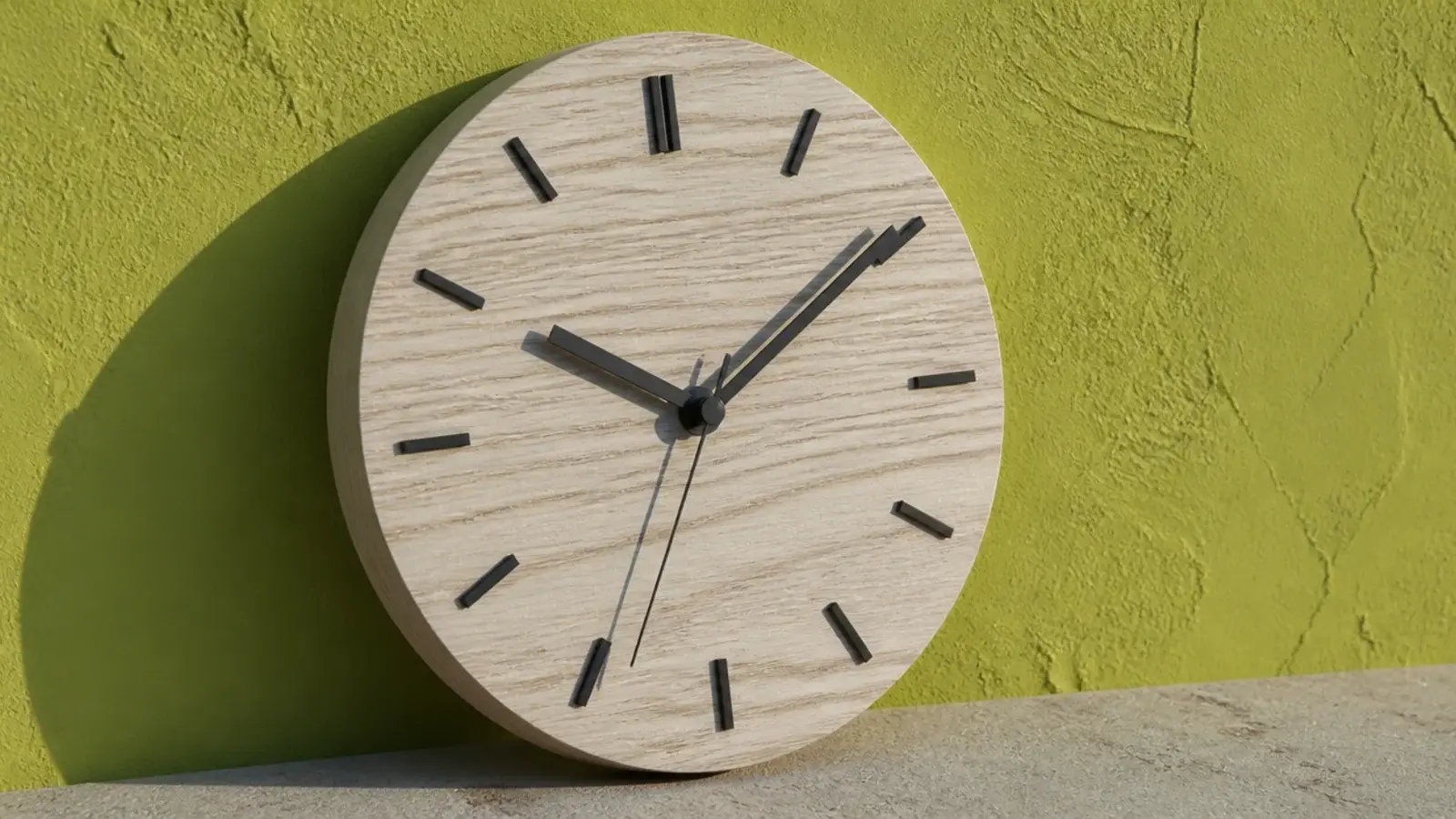 pale ash clock face showing strong open grain across the dial