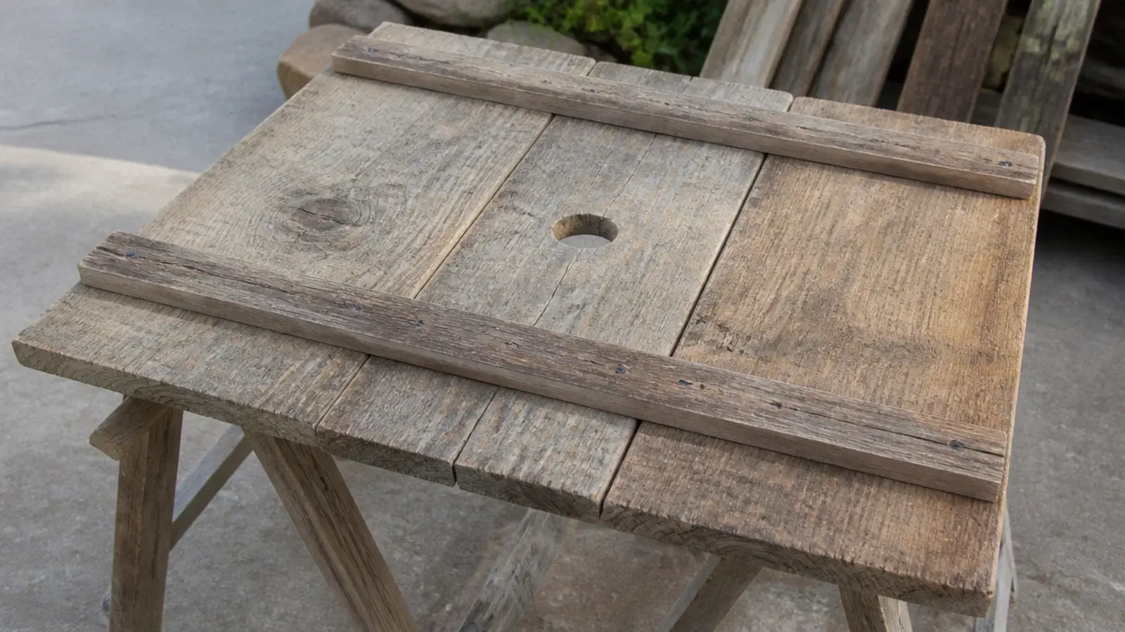 three reclaimed boards joined into a square clock with back battens