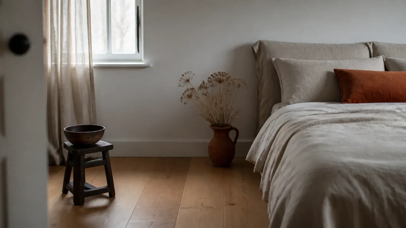 honey oak boards warming a north facing bedroom under cool daylight