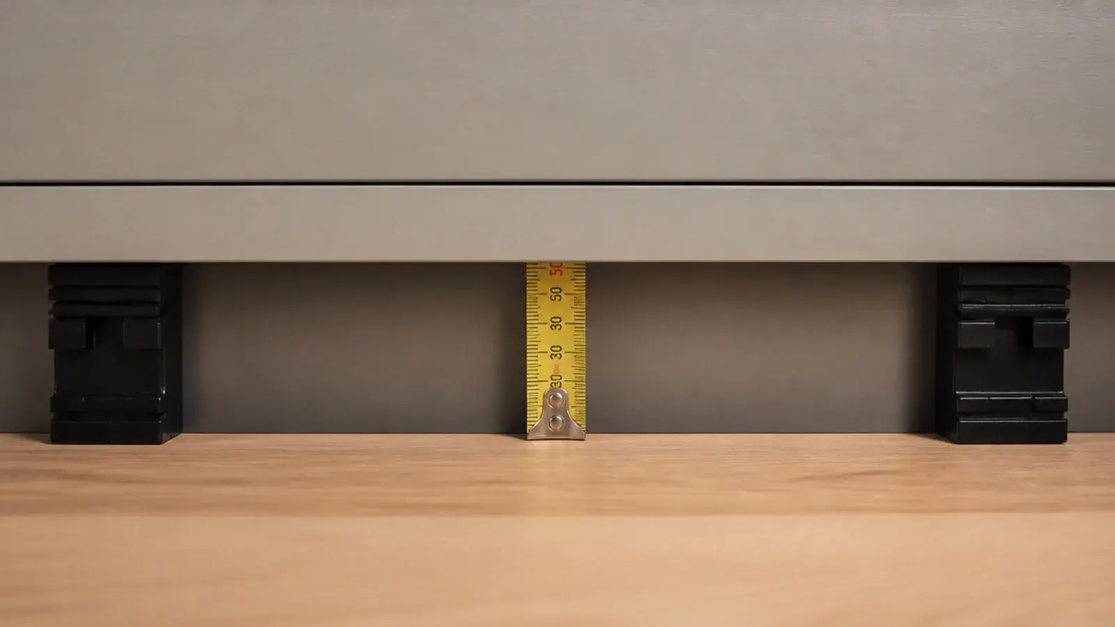 gap left between floorboards and a fitted wardrobe base during install