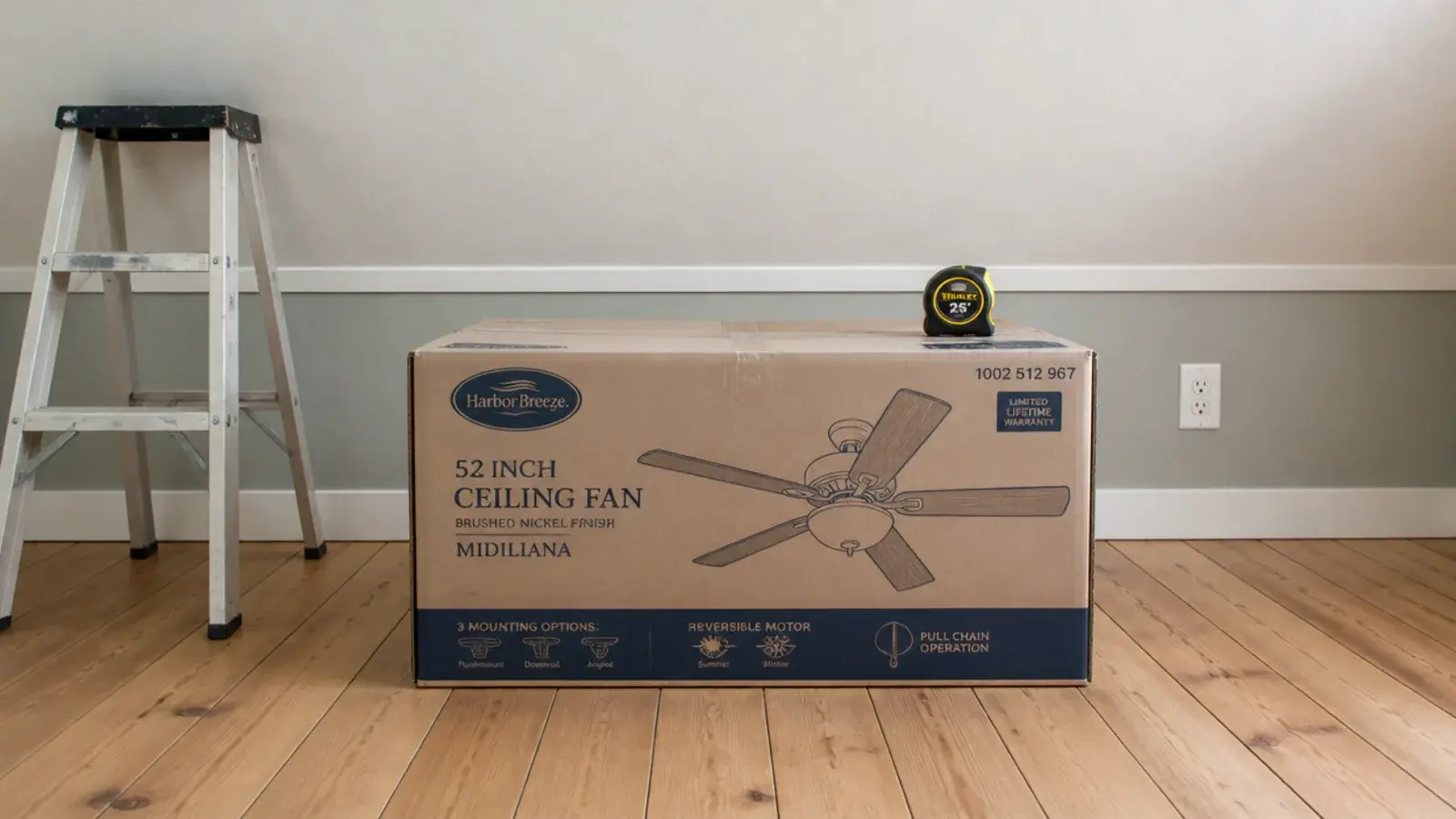 boxed ceiling fan left unopened on the floor of a low attic room