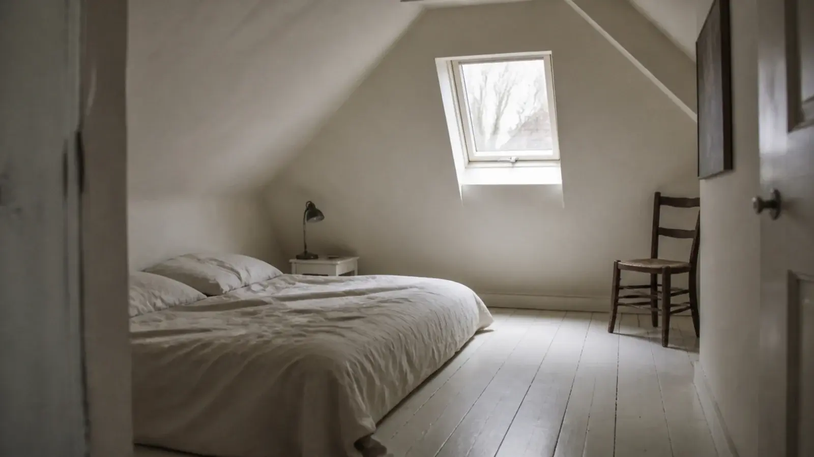 bright chalky bone white brightening a dark small attic bedroom