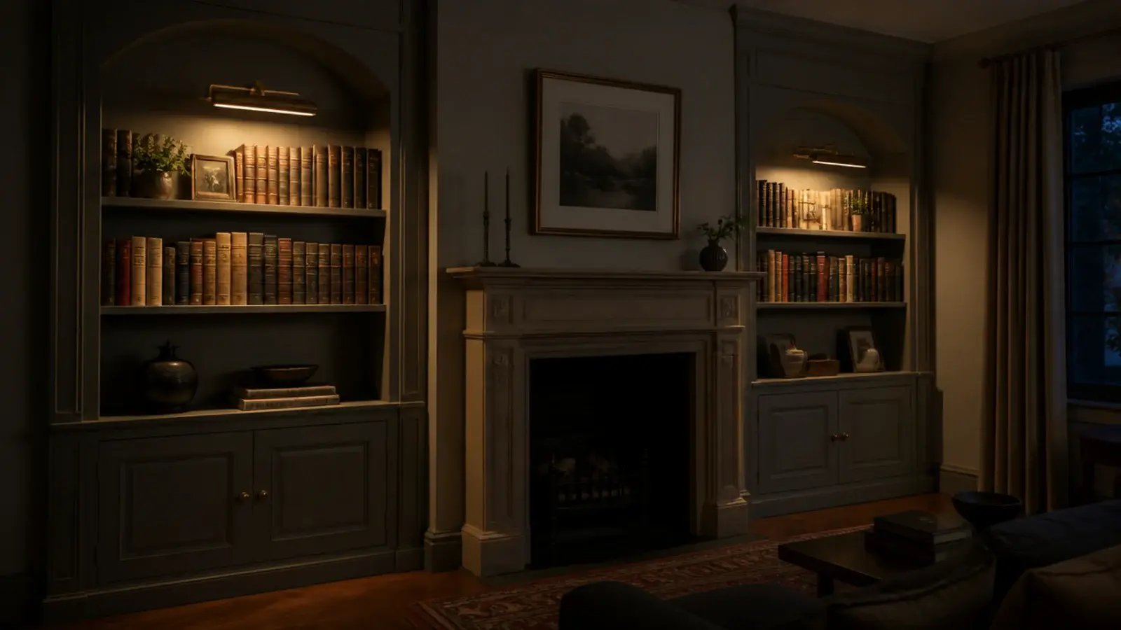 pair of brass picture lights above built in shelves beside a fireplace