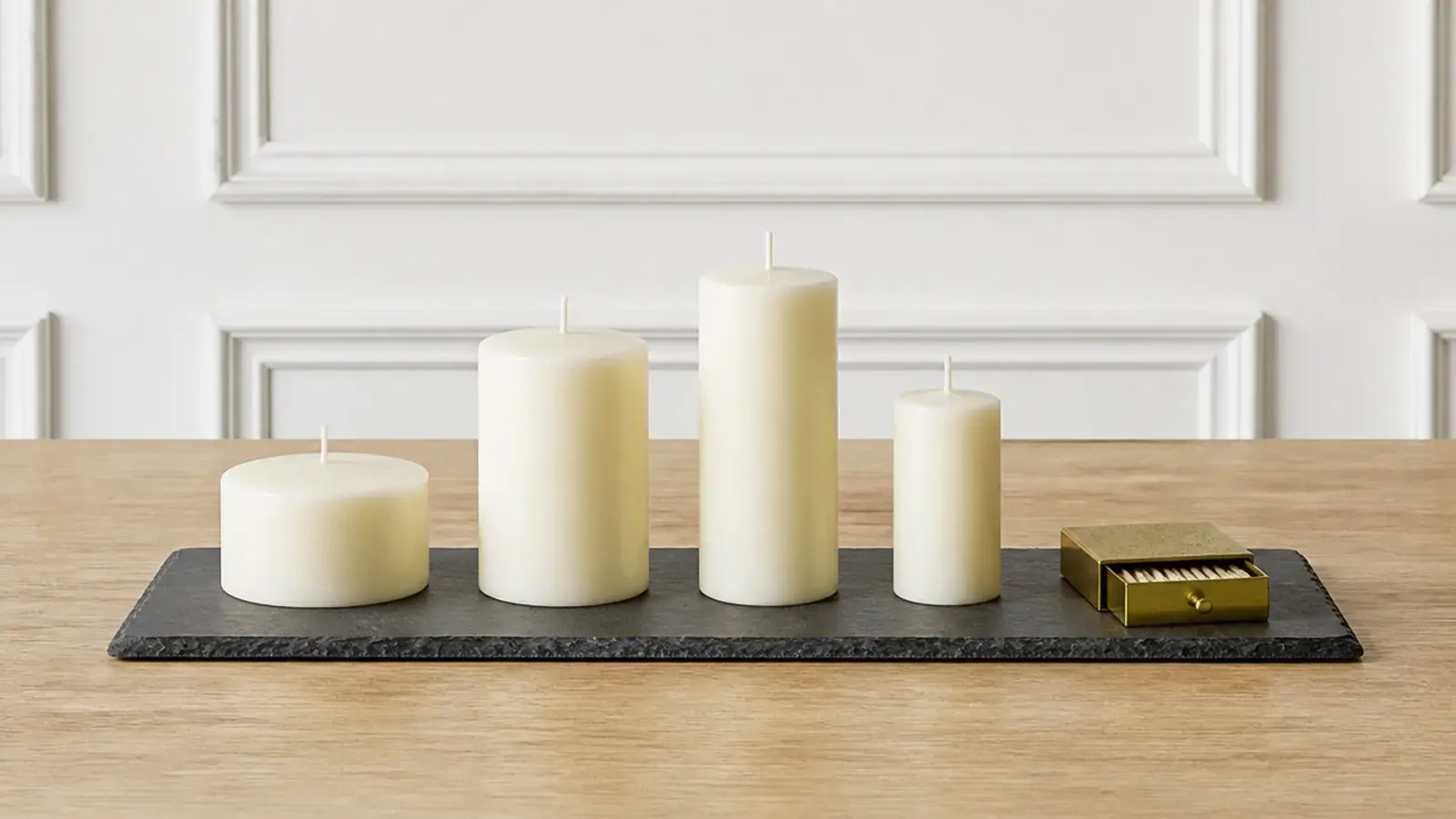 slate serving board used as a heatproof base for table candles