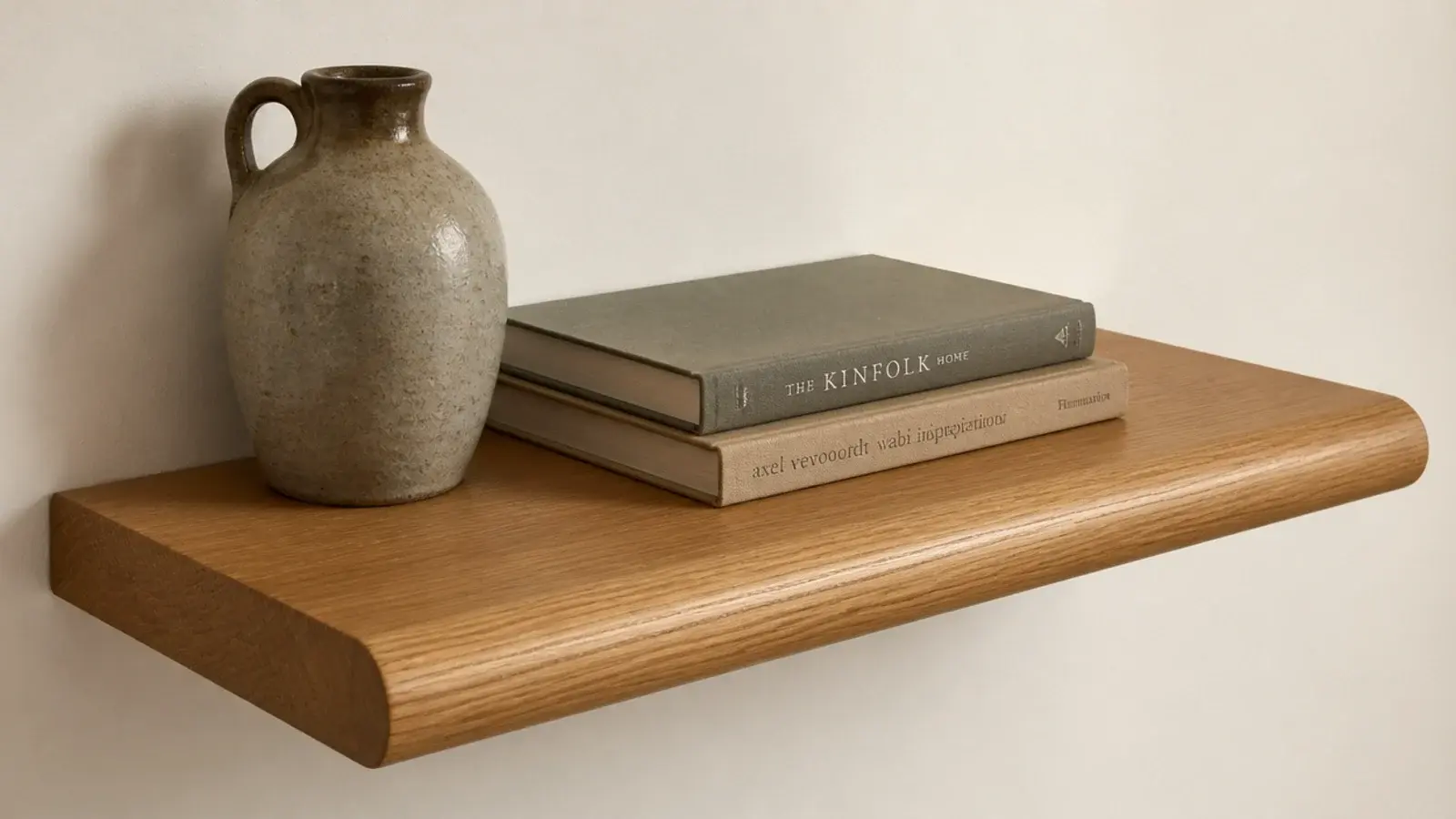 thick oak stair tread mounted as a chunky floating living room shelf