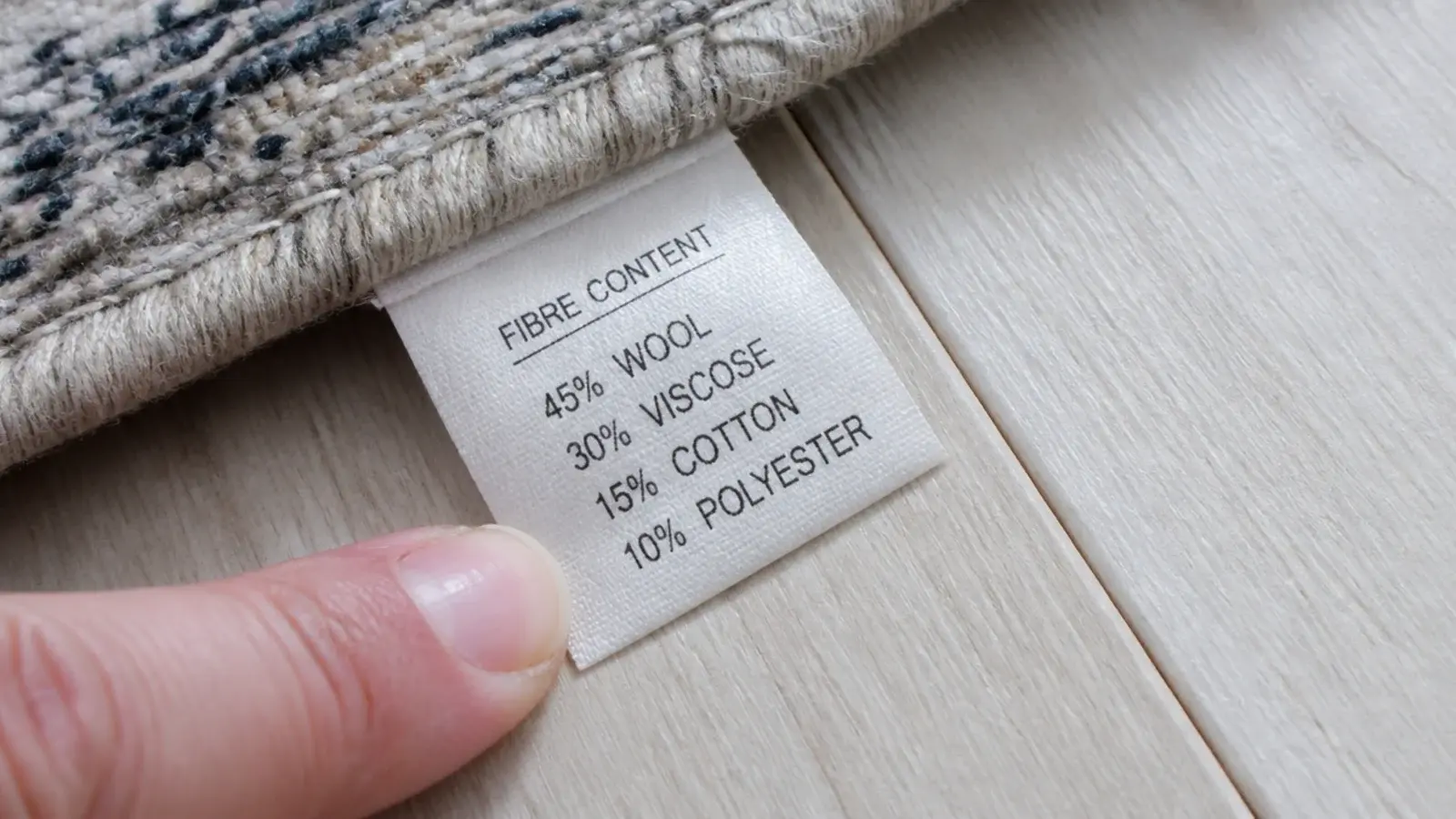 label showing a wool and polypropylene blend percentage on a rug