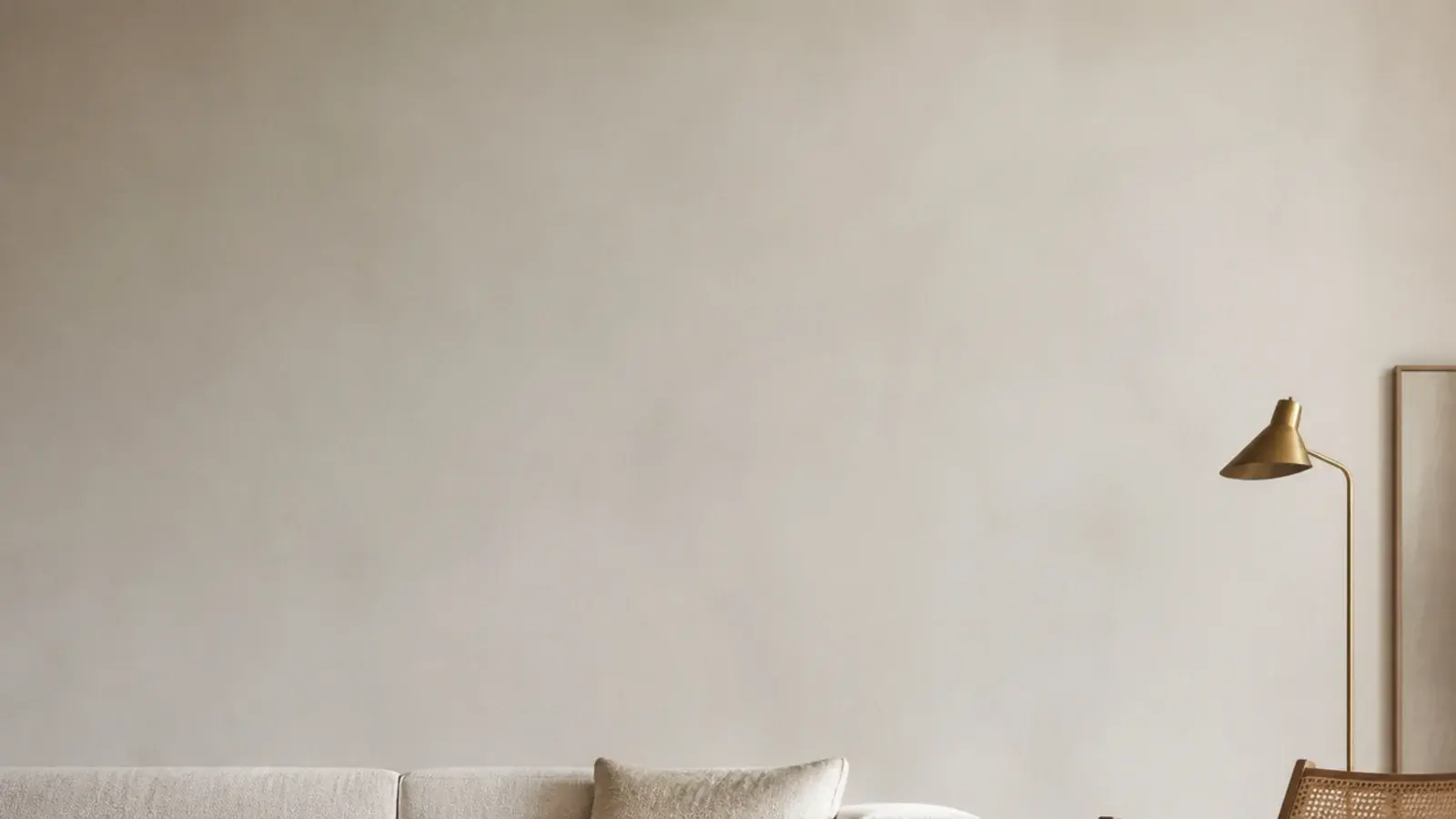 tall view of large area rugs in a living room across pale ash boards