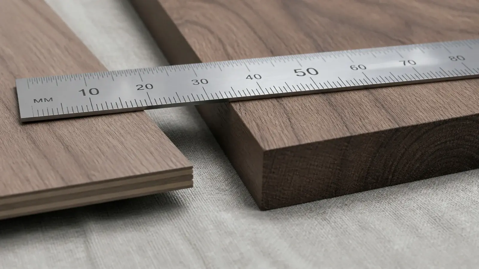 detail comparison of a thin cabinet panel beside a thick slab top edge