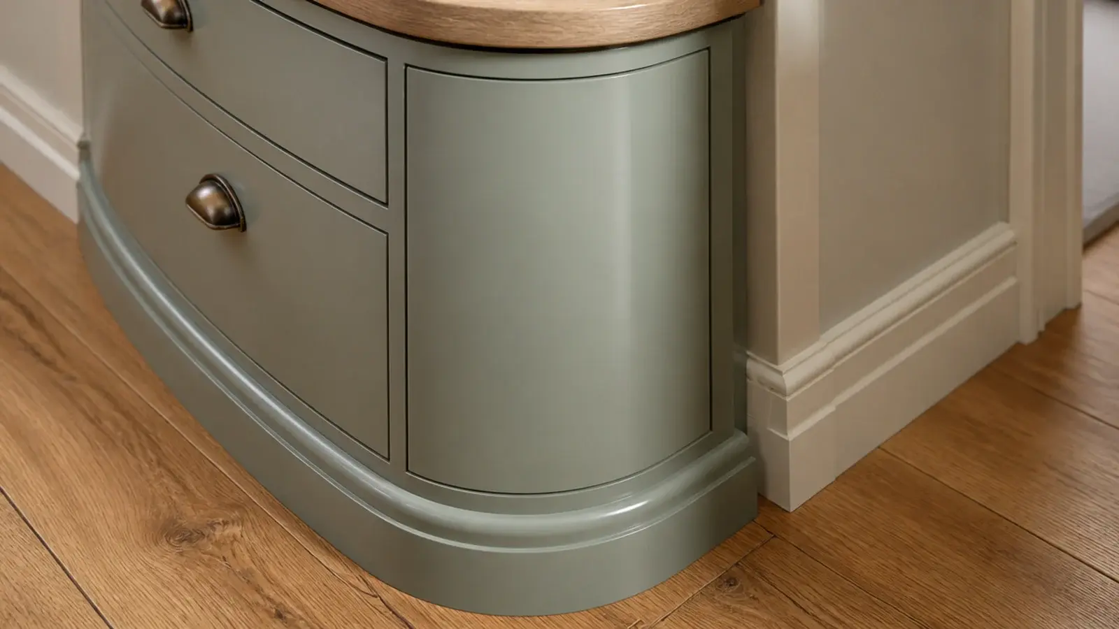 shoe cabinet with a rounded front corner at a tight hallway turn