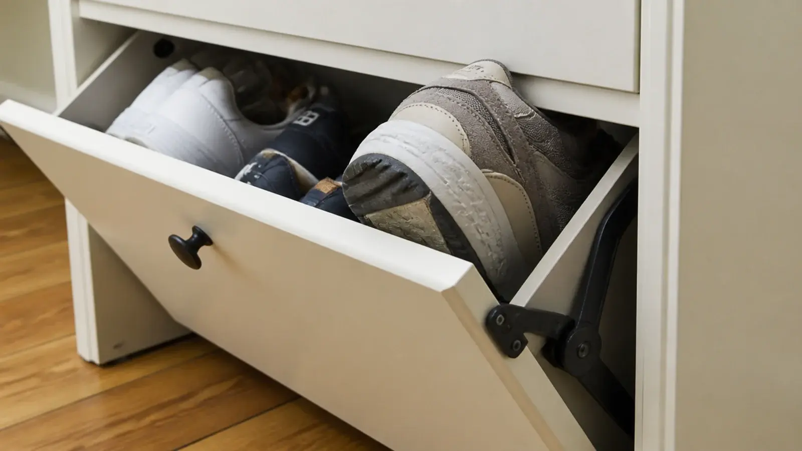 shoe cabinet drawer jammed part open by too many bulky sneakers