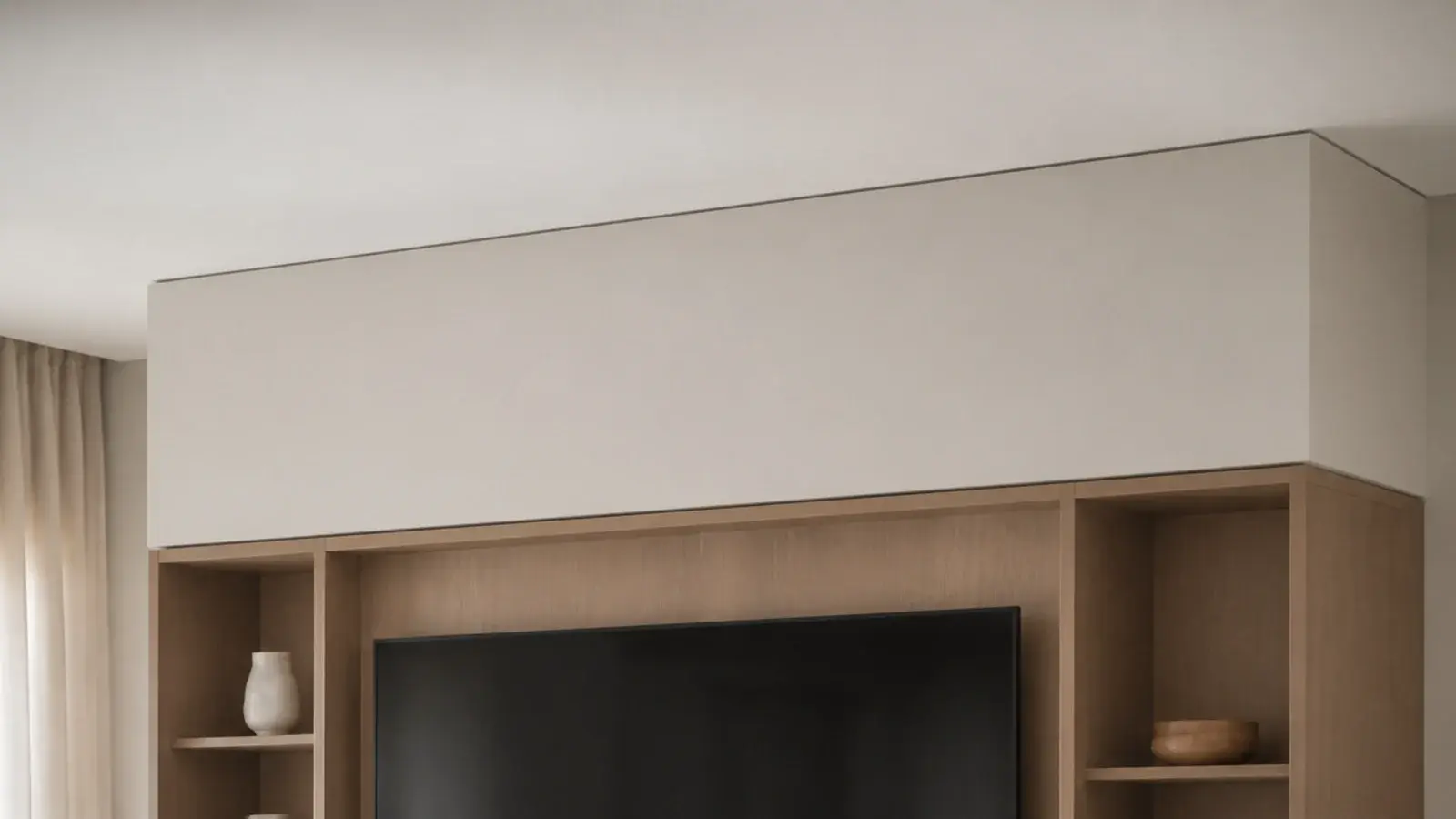 plastered bulkhead bridging the space between joinery and ceiling