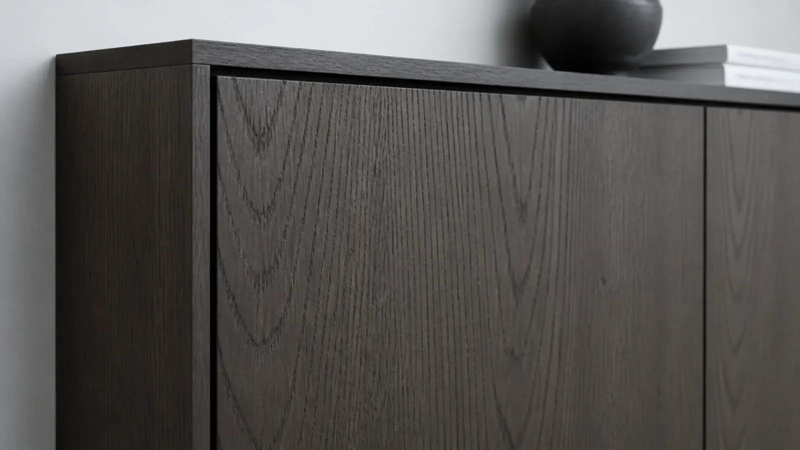 fumed oak cabinet front with a deep grey brown tone and open grain