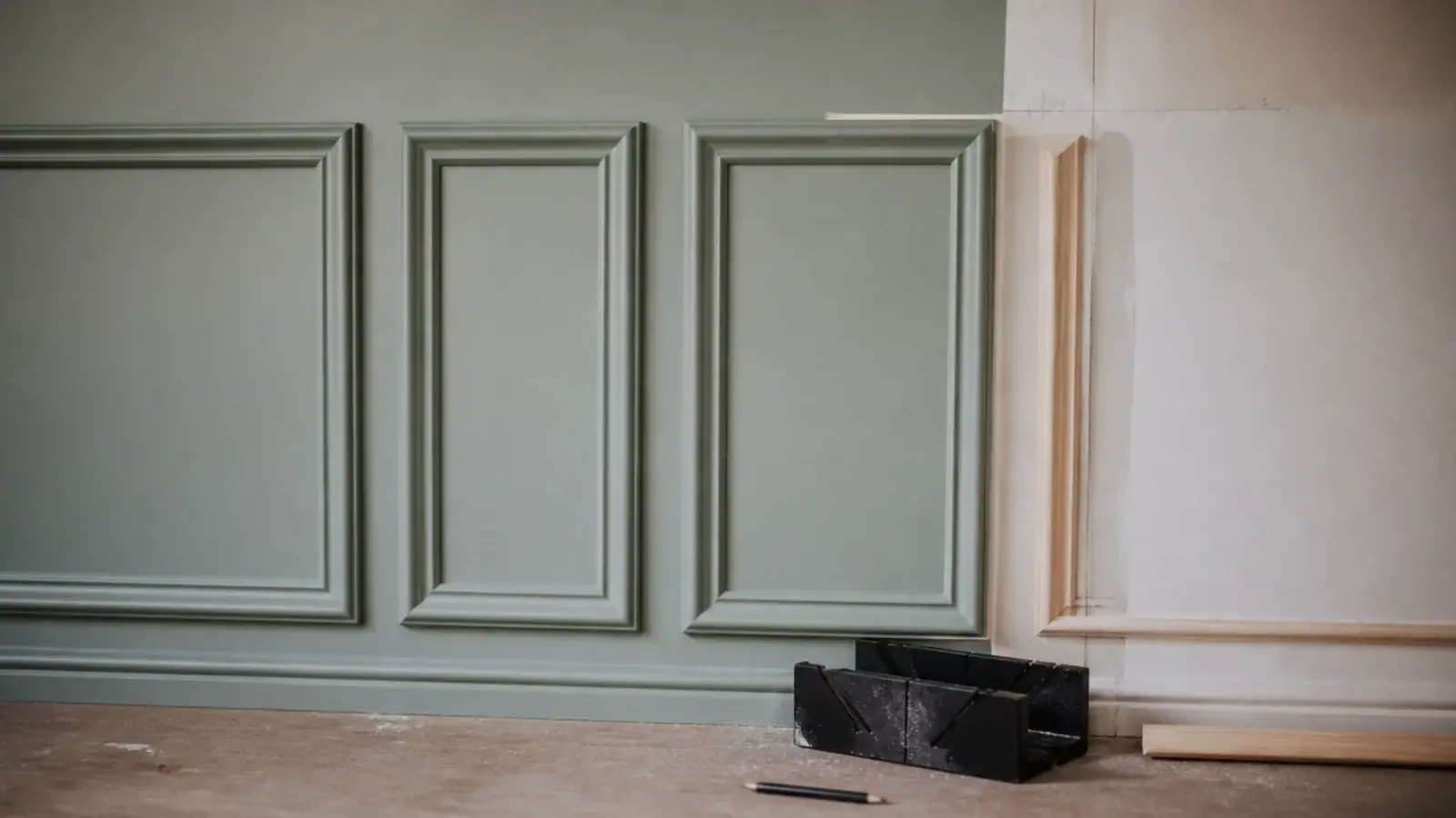 painted moulding boxes laid out on a wall with equal margins measured