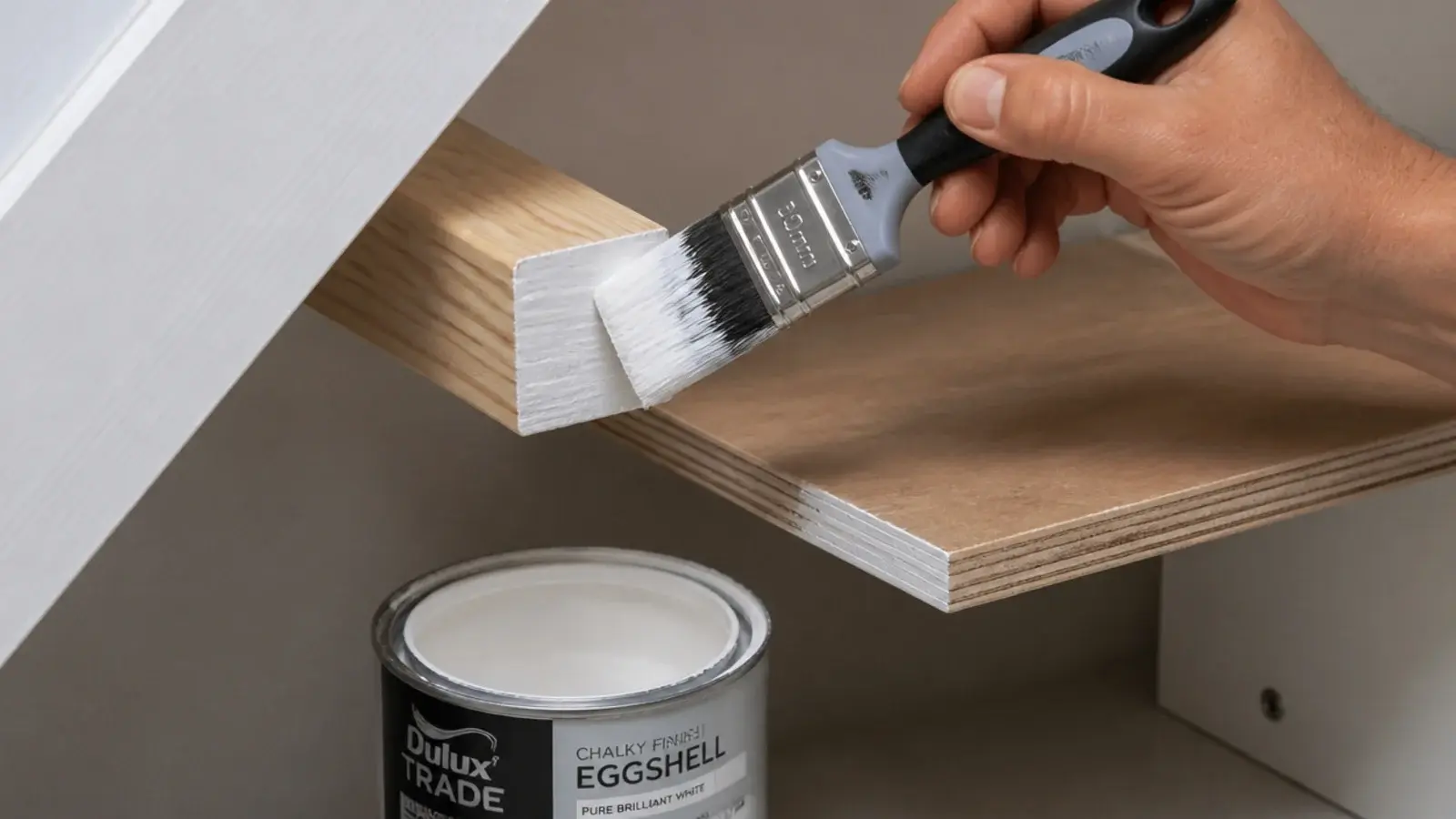 painted batten and shelf edge being finished with a brush