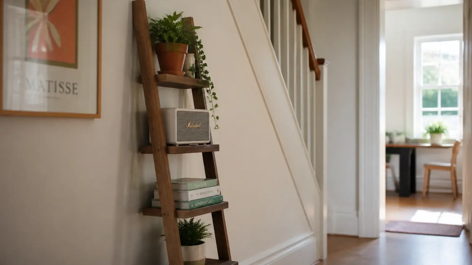 timber ladder shelf leaning against the underside of a staircase