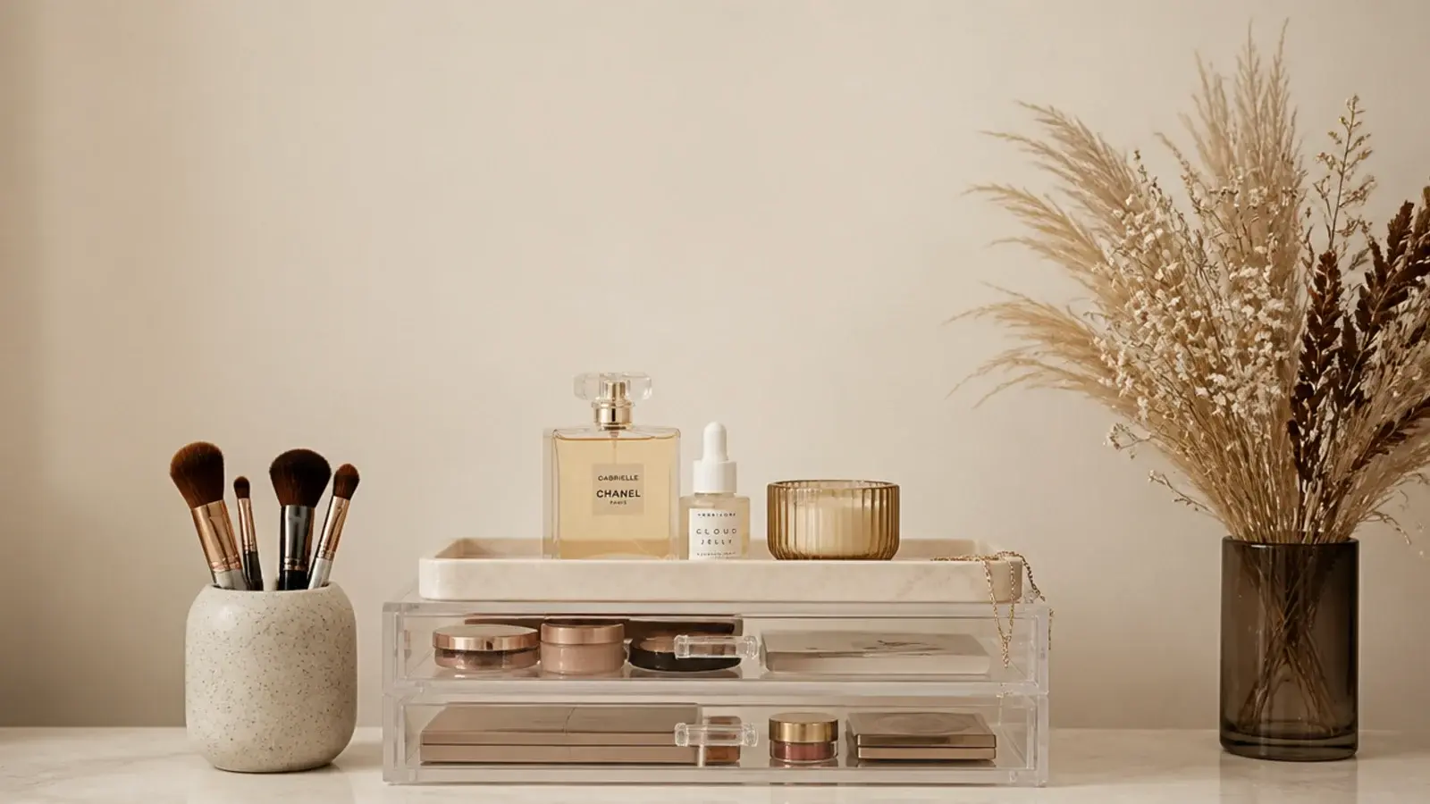 vertical view of clear acrylic vanity organizers styled with oak and stoneware