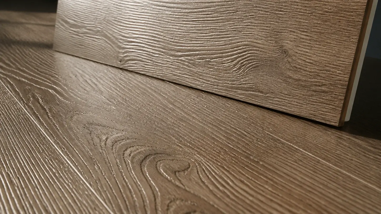 fingertip tracing surface texture that follows printed grain on a plank
