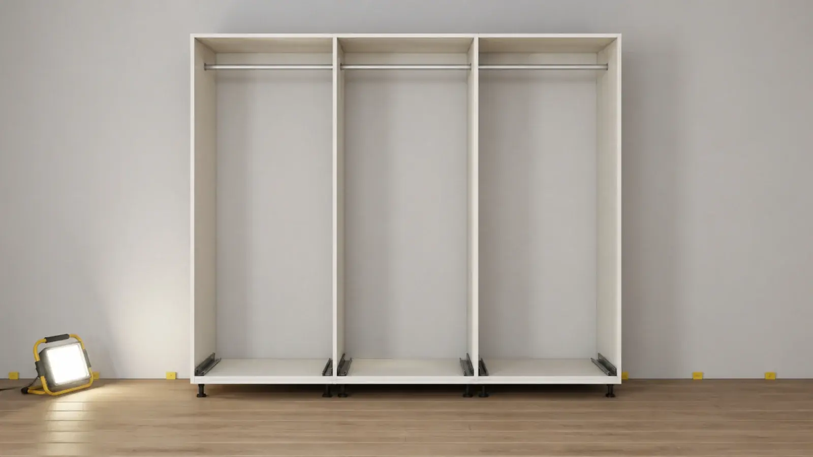 wardrobe base standing on a floating plank floor with a gap behind