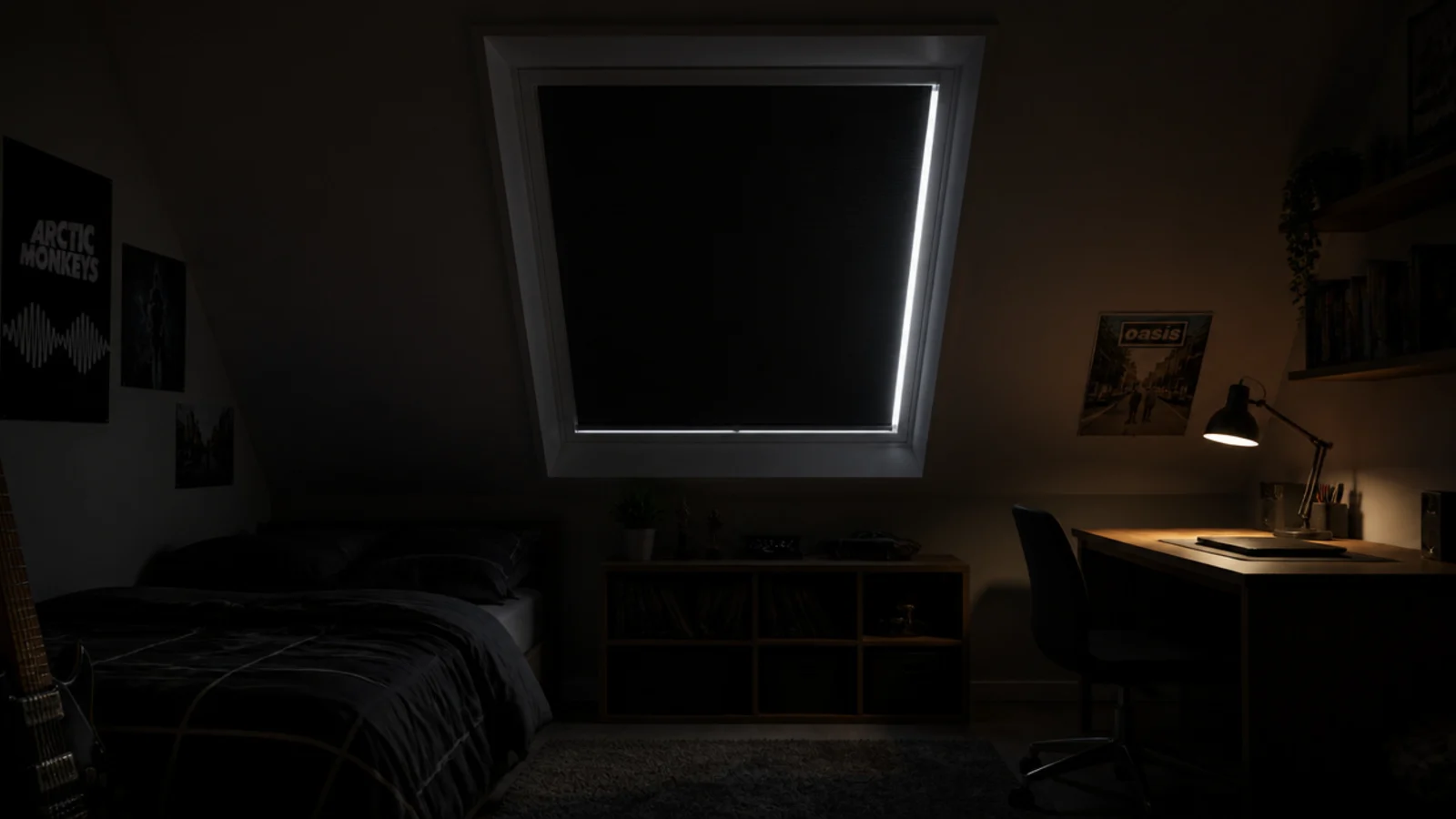 blackout blind drawn across a roof window in a teenage attic room