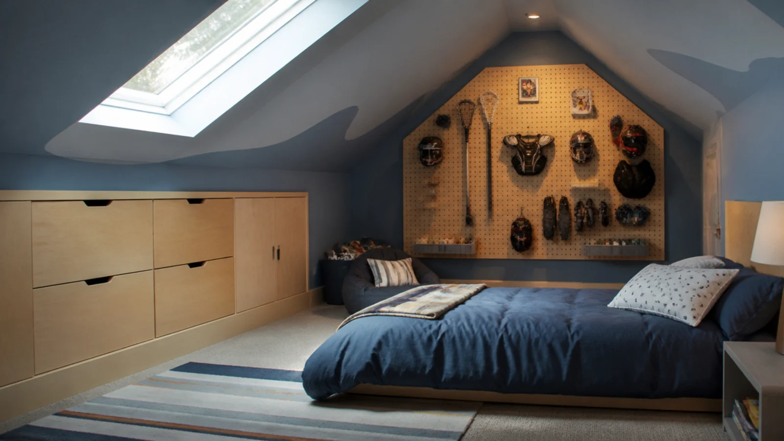 boys attic bedroom ideas with plywood storage a low bed and painted slopes