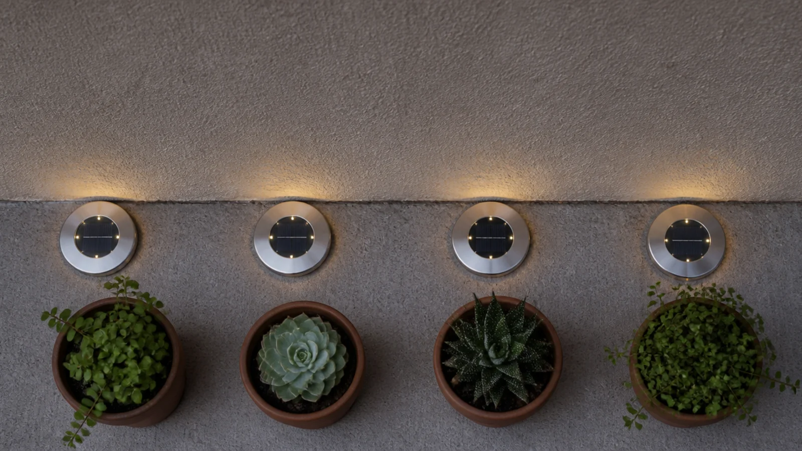 flat solar disc lights lining the floor edge of a small balcony