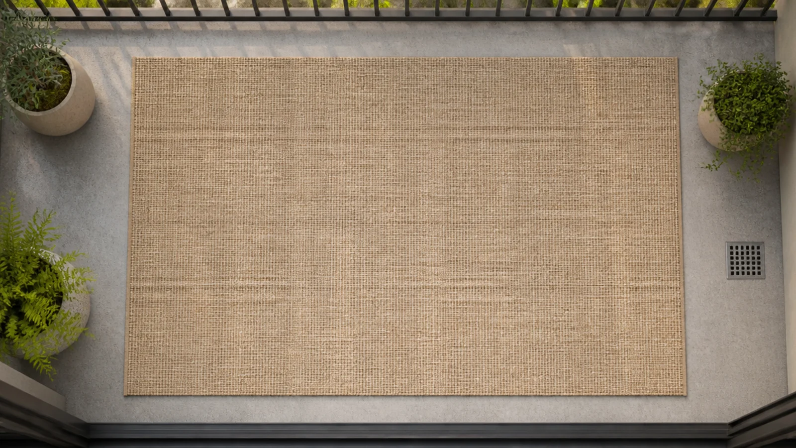 open weave rug covering most of a balcony floor with neat margins