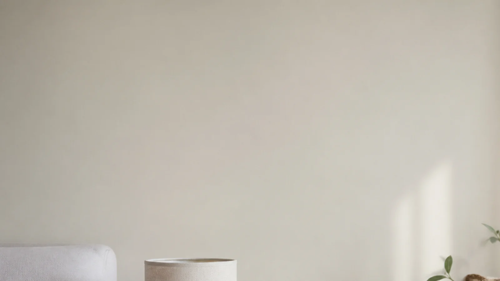 tall view of an organized bedside table with zoned drawer and clear top