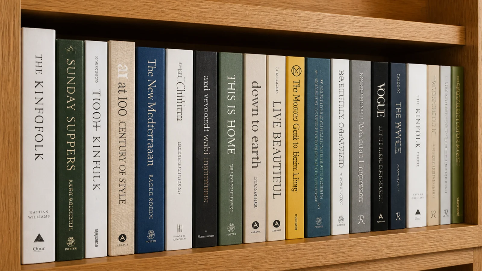 row of books pulled forward so every spine sits flush at the shelf edge