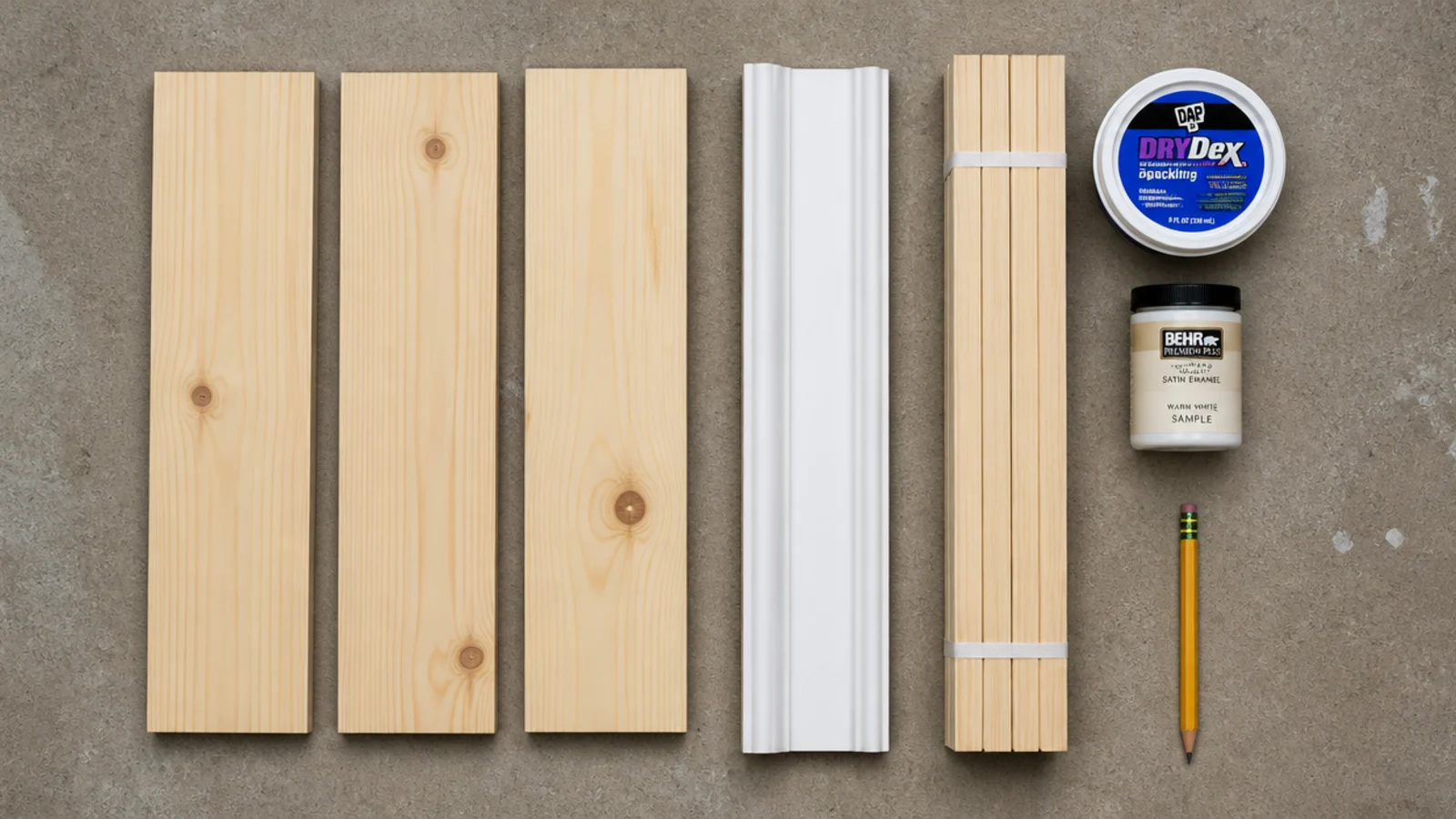 stack of stock pine boards trim and paint samples ready for a shelf build