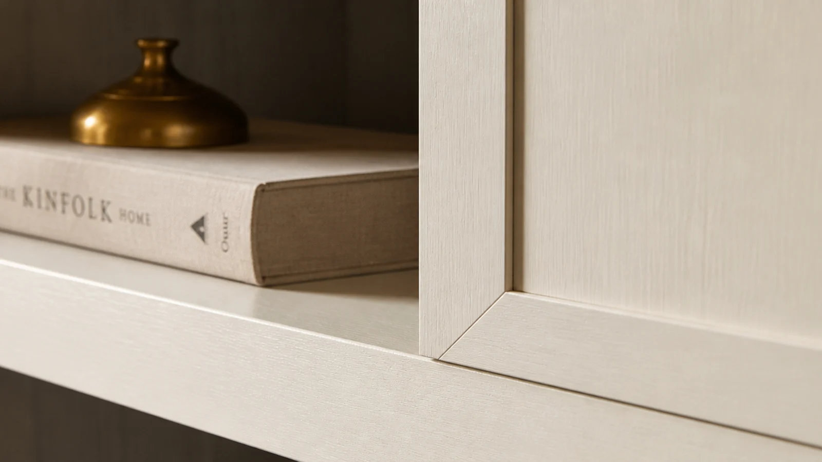 painted poplar face frame covering the edges of budget built-in shelving