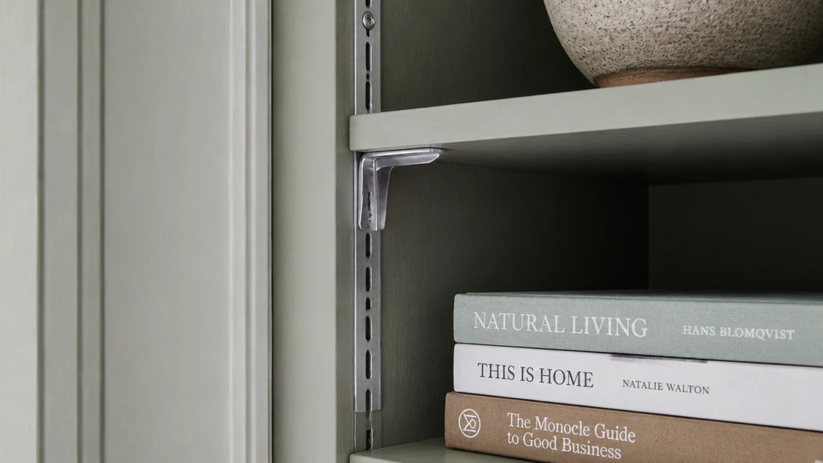 metal shelf standards mounted inside painted budget built-in shelving