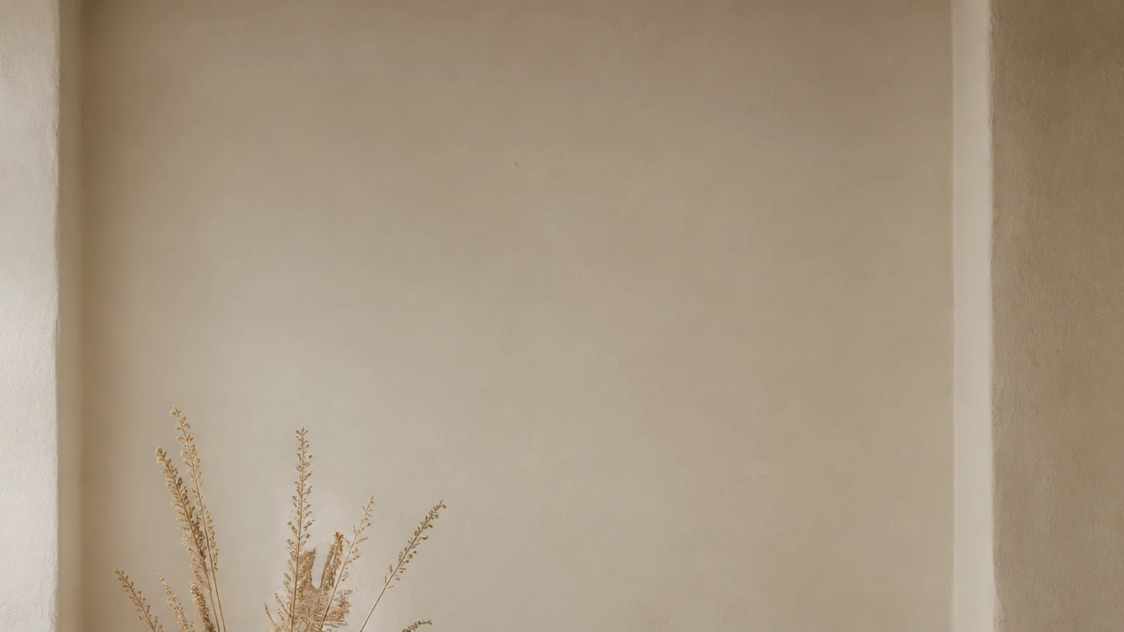 vertical image of budget built-in shelves painted white and styled simply