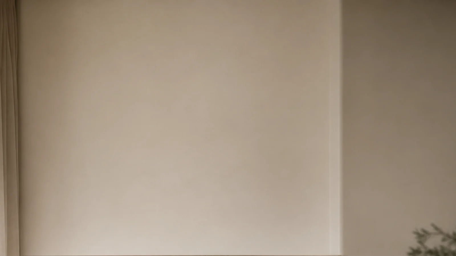 vertical view of built in shelf styling in a warm cream living room