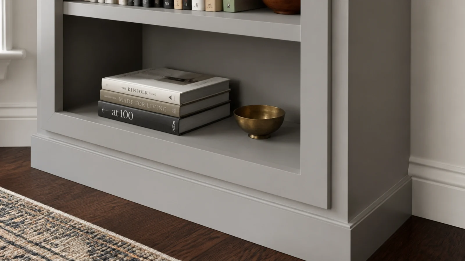 plain bookcase converted into built-in shelving with trim and matching paint