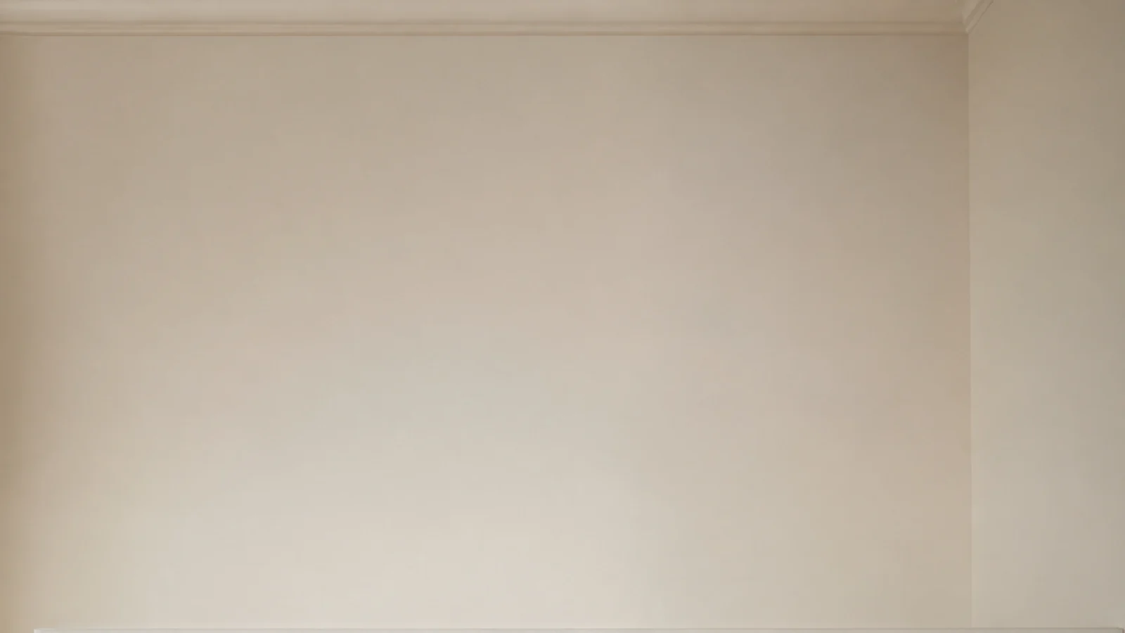 Tall view of cream built in shelves styled in a small living room