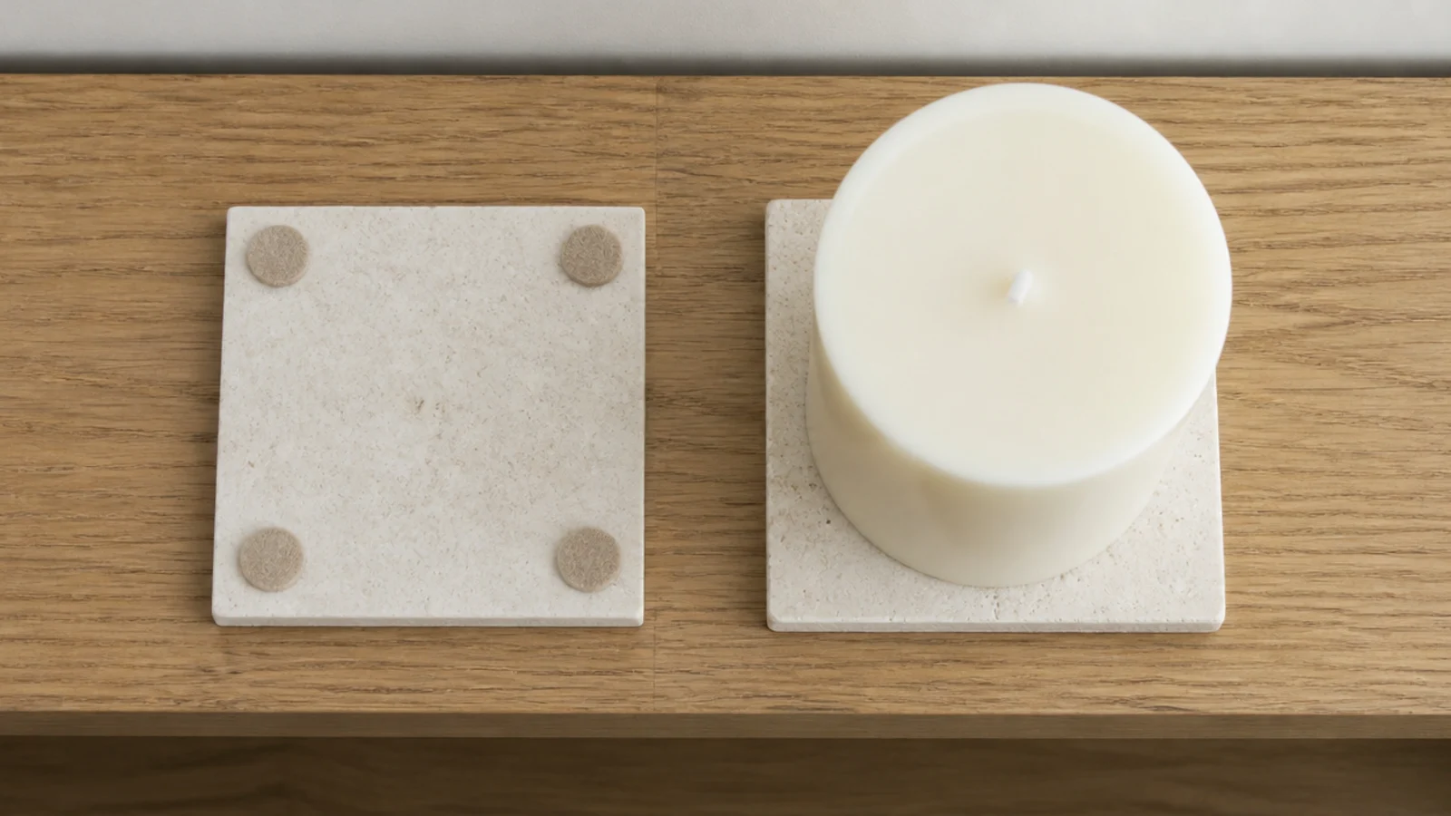 felt pads and a tile coaster placed under candles on a wooden shelf