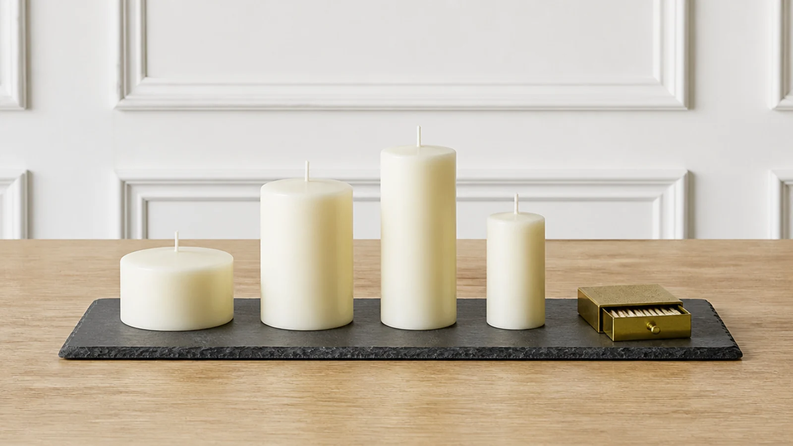 slate serving board used as a heatproof base for table candles