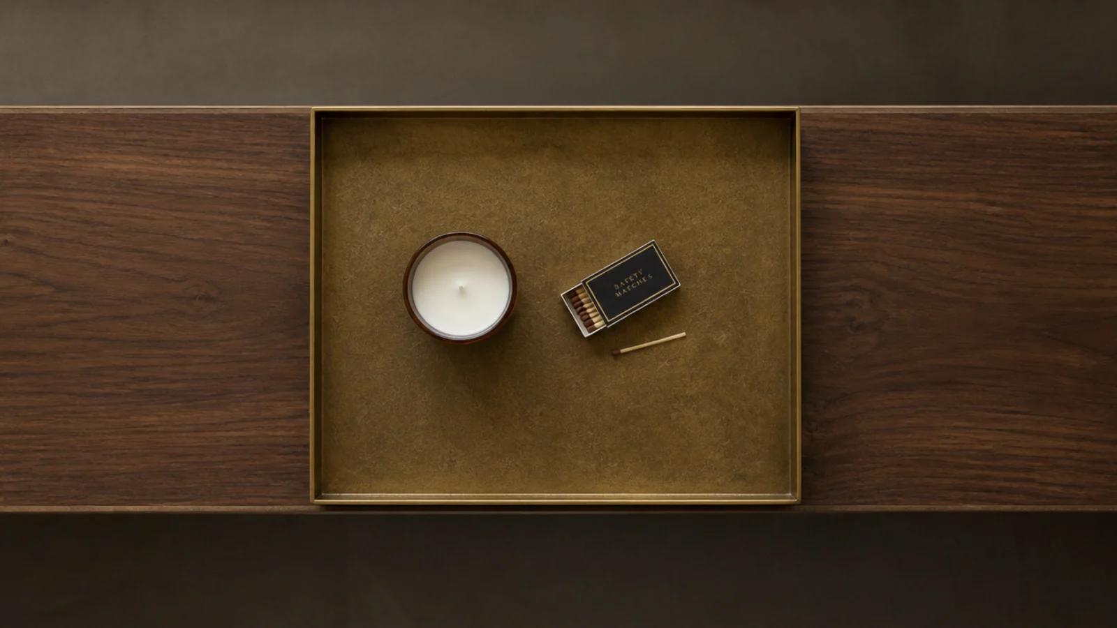 large rectangular tray covering roughly a third of a long table