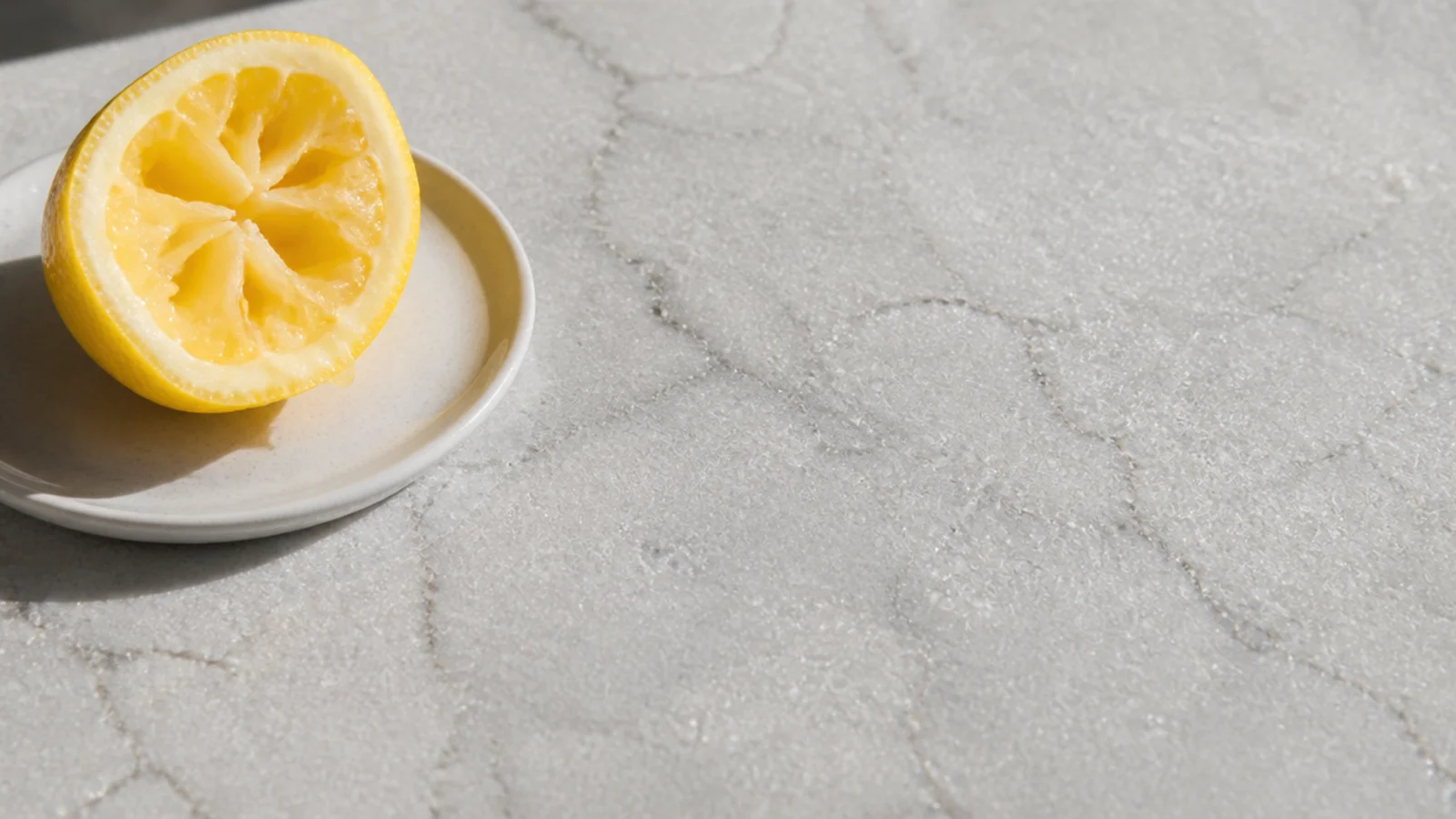 pale quartzite slab with crystalline sparkle under direct light