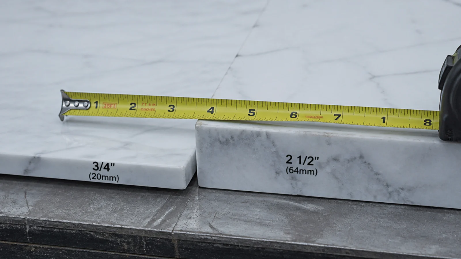 three quarter inch marble edge shown against a thicker slab sample