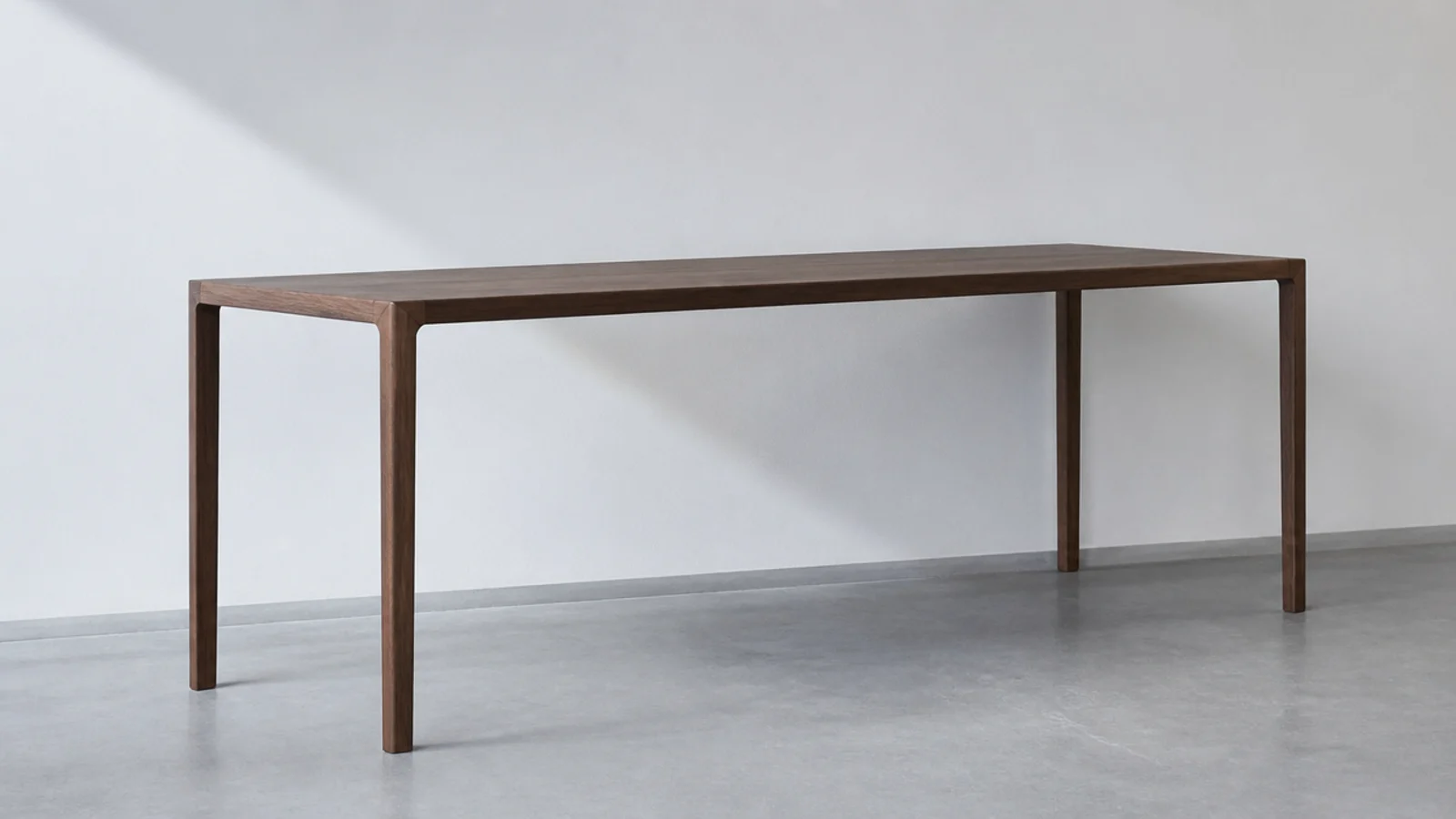 slim table top and slim legs of matching visual weight in profile