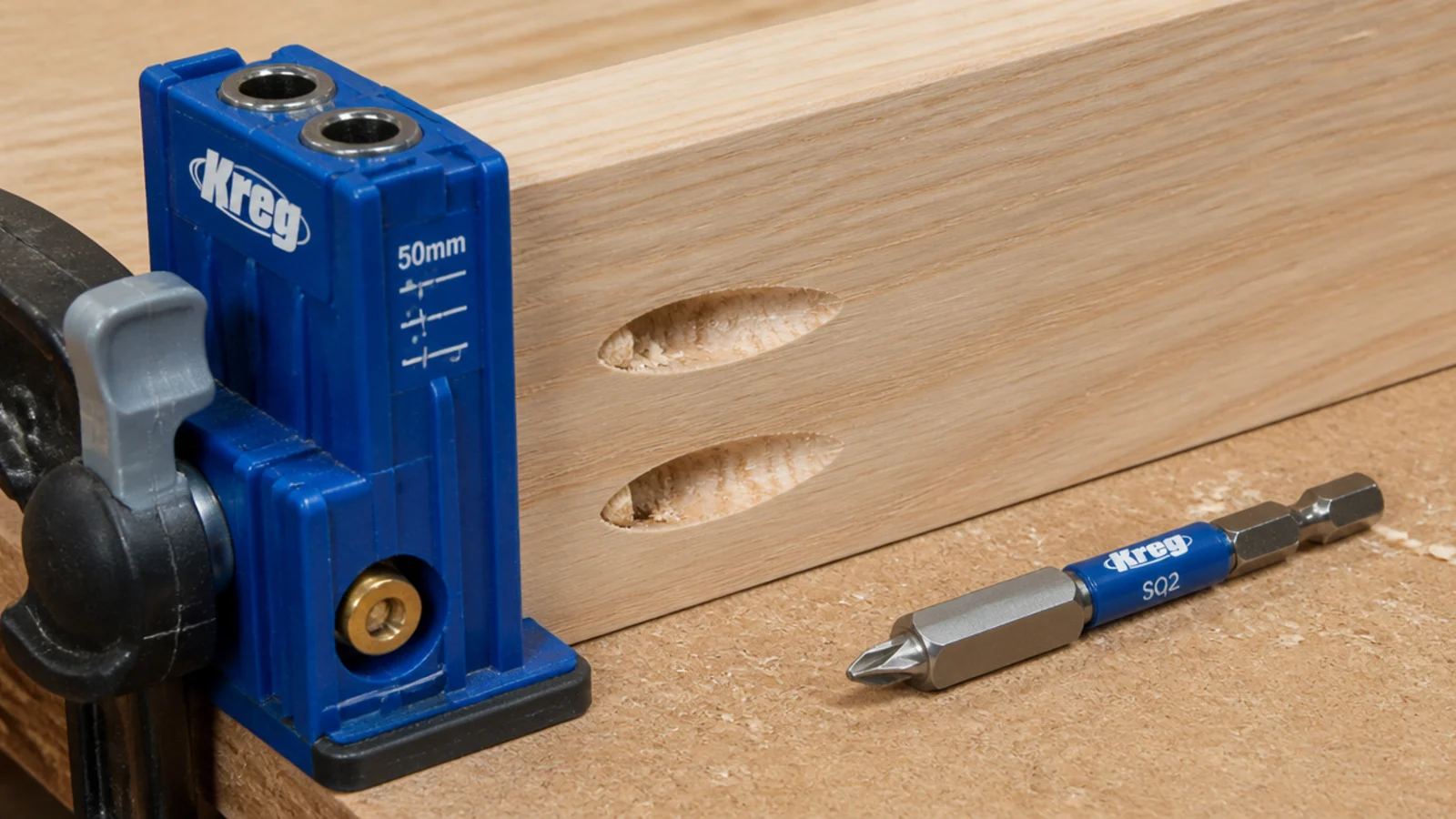 pocket holes drilled into the inside face of a table rail