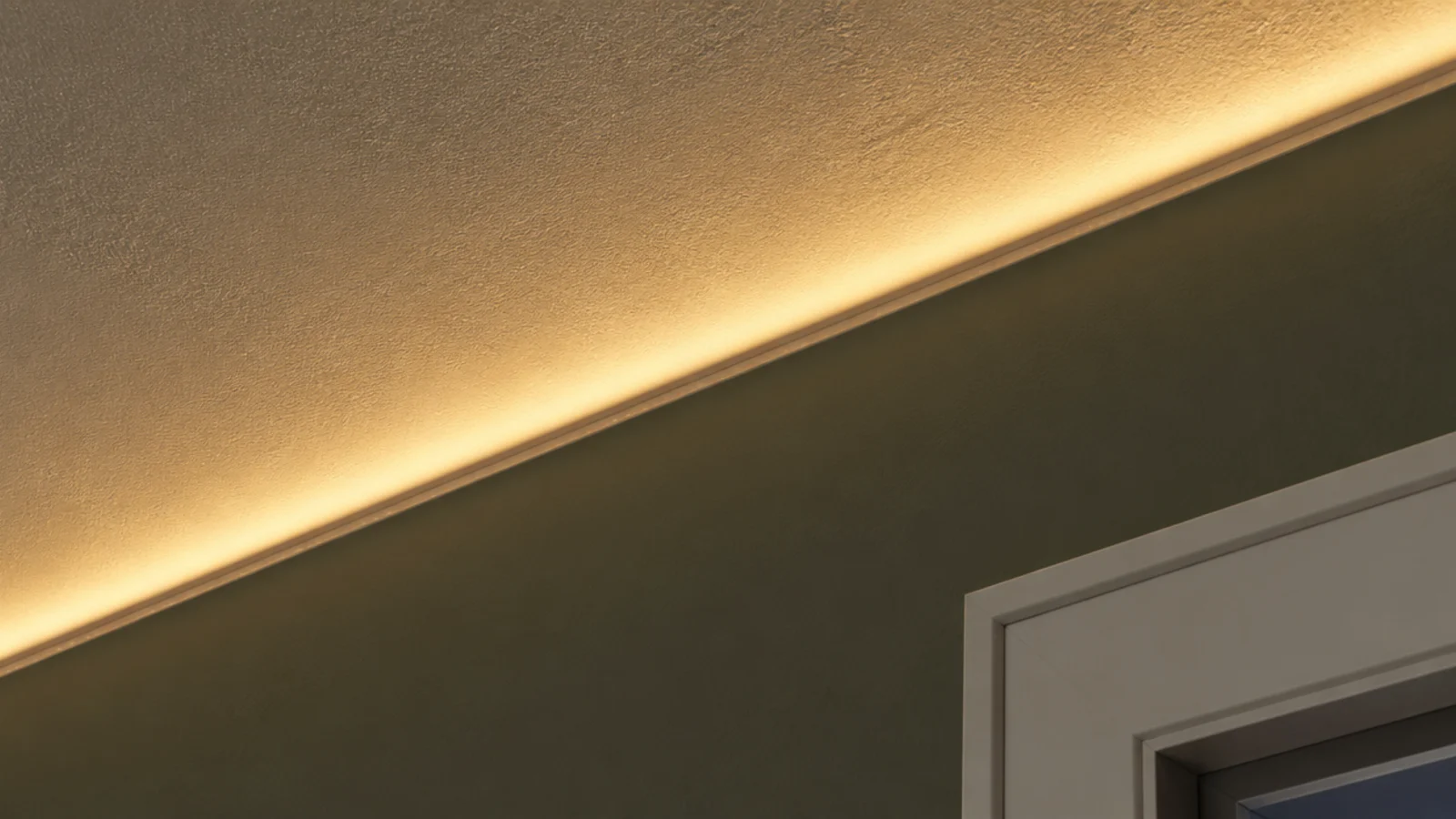 lights tucked into the shadow line where ceiling meets wall
