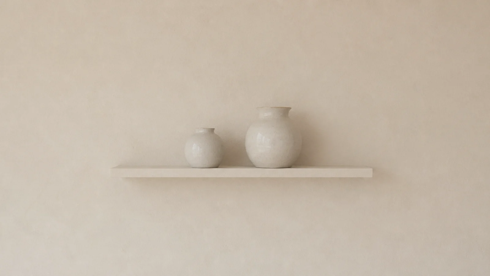 pine floating shelf repainted the wall color and blending into the plaster